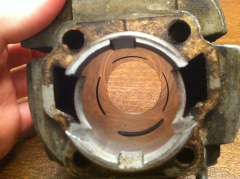 1981 Garelli Rally Sport - This is a close-up view of a worn motorcycle cylinder, showing internal scoring.