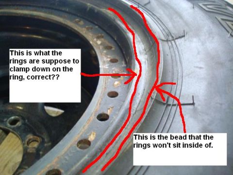 1995 Ford Bronco - A close-up view shows a tire bead that is not properly seating on the wheel rim, indicated by red markings.