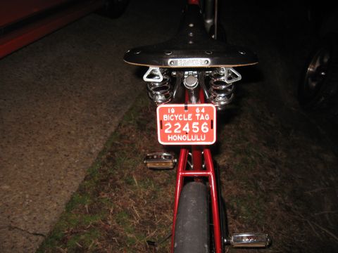1994 Ford Bronco - Rear view of a bicycle a vintage Honolulu bicycle tag from 1964.