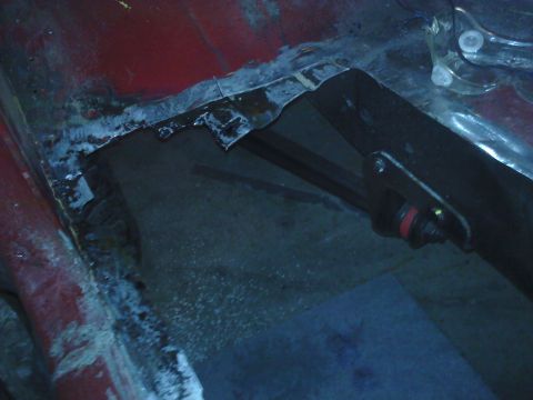 1978 Ford Bronco - This image shows the damaged floor pan of a vehicle, likely undergoing repair work.