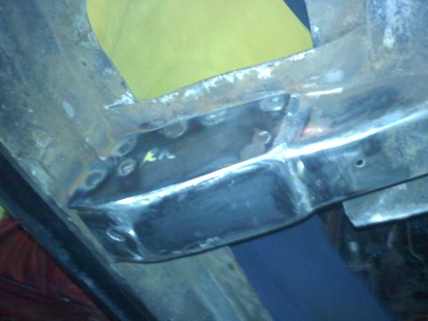 1978 Ford Bronco - This photo shows a close-up view of metal frame repair work, possibly on a vehicle's undercarriage.