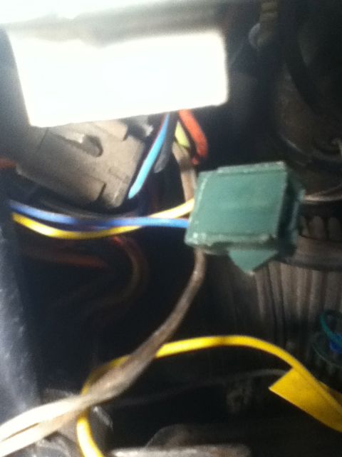 1979 Ford Bronco - Automotive wiring harness with a green connector and various colored wires visible.
