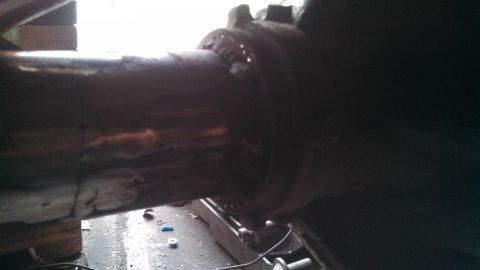 1967 Ford F-250 - Detail of a metal component, possibly from a vehicle's suspension system, showing signs of wear and repair.