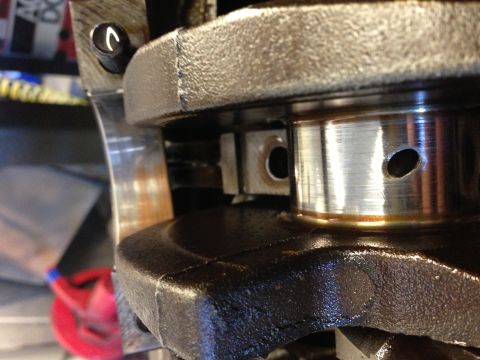 1966 Ford Bronco - Close-up view of a crankshaft bearing, showing signs of lubrication.