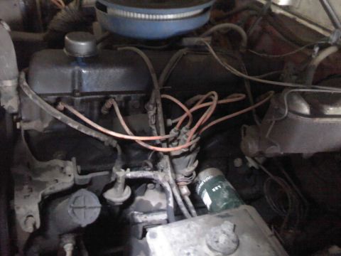 1979 Ford Bronco - Close-up view of an engine bay, showing various engine components and wiring.