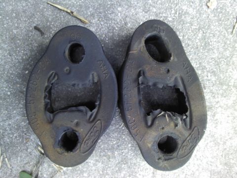 2000 Lincoln Continental - These Ford exhaust hangers are stamped with part numbers and a year, but do not match the claimed vehicle.