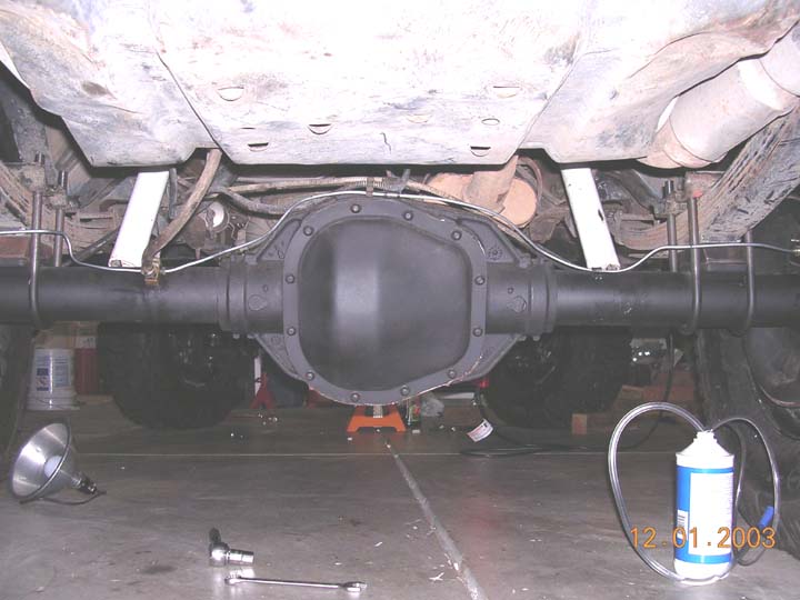 no more shock anchors to slow me down.  the 10.25 is a big axle though.  40's would be very nice.
I also bent all new brakelines, moving the little metal retainer up to the top of the tube to protect the lines