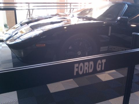 1998 Toyota Camry - A black Ford GT is displayed indoors with a 'FORD GT' sign in the foreground.