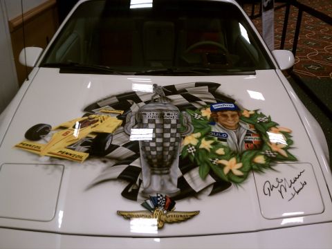 1998 Toyota Camry - Airbrushed hood art depicts a racing theme with a trophy, race car, and driver portrait.