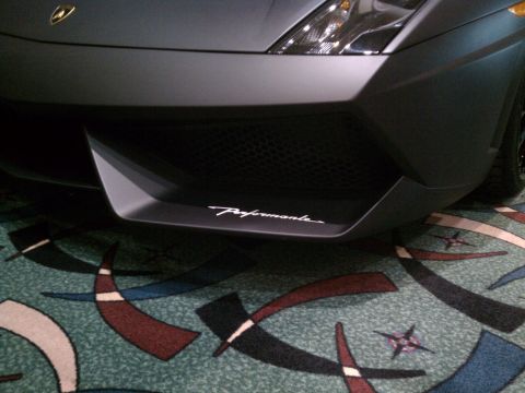 1998 Toyota Camry - Close-up of a Lamborghini Gallardo's front bumper, the 'Performante' designation.
