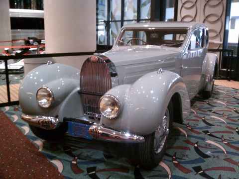 1998 Toyota Camry - This vintage Bugatti is a classic automobile with distinctive styling and chrome accents.