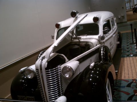 1998 Toyota Camry - This vintage ambulance is displayed with its hood open, revealing the engine compartment.