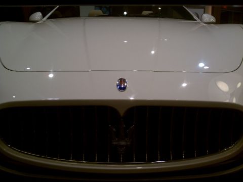 1998 Toyota Camry - Front view of a white Maserati, showing the distinctive grille and badge. Watermark present.