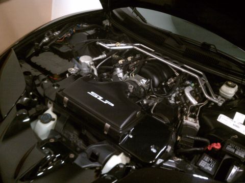 1998 Toyota Camry - Engine bay with aftermarket SLP air intake and strut brace.