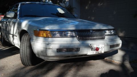 1993 Mercury Grand Marquis - The front end of a white 1993 Mercury Grand Marquis is shown in this photo.