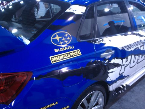 1998 Toyota Camry - A Subaru police car with custom graphics is displayed.