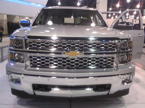 1998 Toyota Camry - Front view of a silver Chevrolet Silverado pickup truck at an auto show.