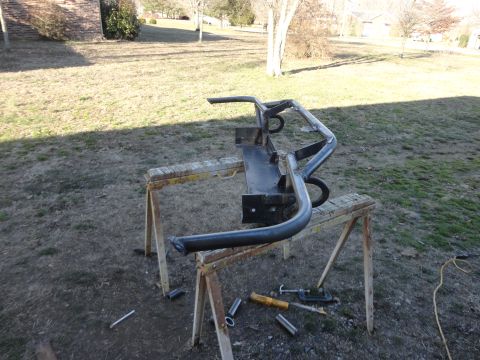 1990 Ford Bronco - A custom front bumper, likely for an off-road vehicle, is shown mounted on sawhorses outdoors.