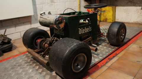 1973 Ford Ranchero - This custom-built go-kart features a unique body constructed from a Diebels beer crate, complete with a chrome fuel tank and racing tires.