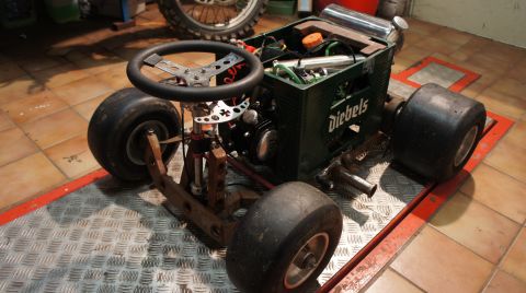 1973 Ford Ranchero - This homemade go-kart is constructed from a beer crate and features a steering wheel and exposed engine parts.