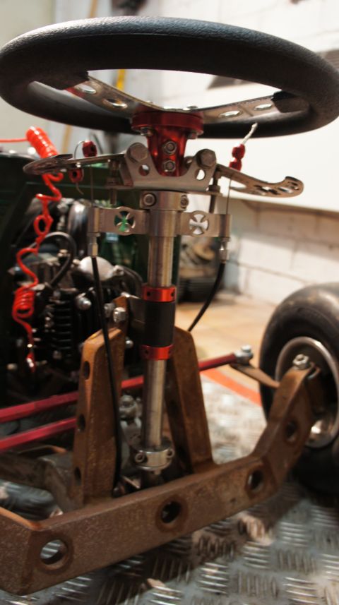 1973 Ford Ranchero - The steering column and front suspension of a go-kart are shown in detail.