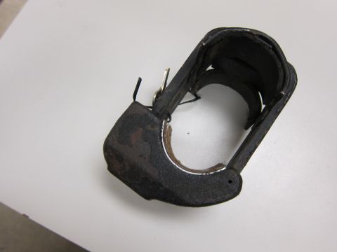 2001 Ford Crown Victoria - This appears to be an old metal clamp, possibly for a tool or equipment.