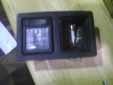 2003 Ford Crown Victoria - This is a car interior light assembly, likely for a dome or map light.