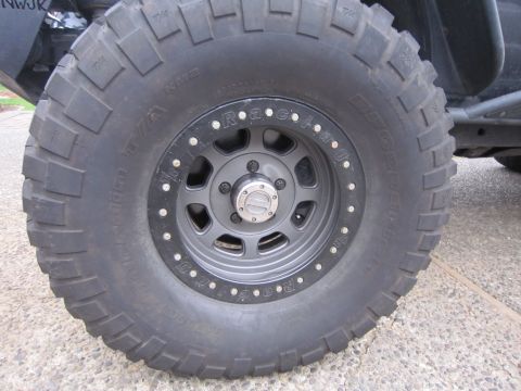 2008 Jeep Wrangler - Close-up of a BFGoodrich tire and beadlock wheel on a Jeep Wrangler.