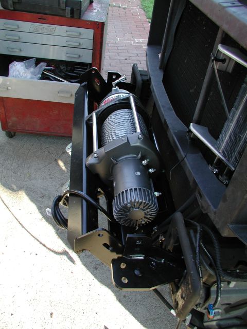 2001 Ford Excursion - I had to tilt winch tray forward to put in M15000 winch. After mounting my HS9500, I realized the control holes in the bumper were on the o…