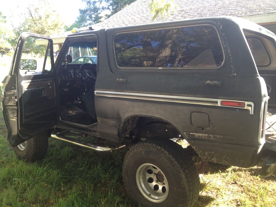 1978 Ford Bronco with driver door open, side view