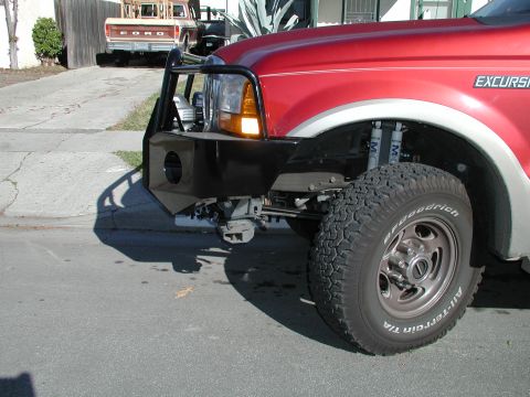 2001 Ford Excursion - Bumper side view, notice blocker beam behind and below bumper. I think I am going to take it off.