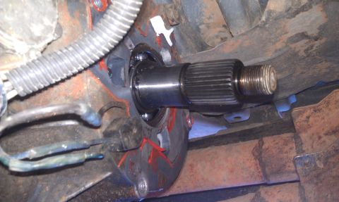 1993 Ford Bronco - Close-up of a driveshaft component being installed or serviced.