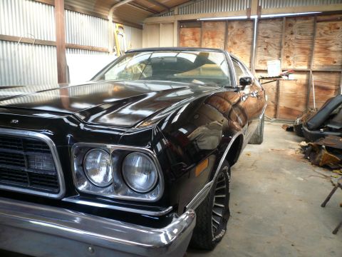 1975 Ford Ranchero - This black vehicle appears to be a 1974 Ford Ranchero, not a 1975 model as claimed.