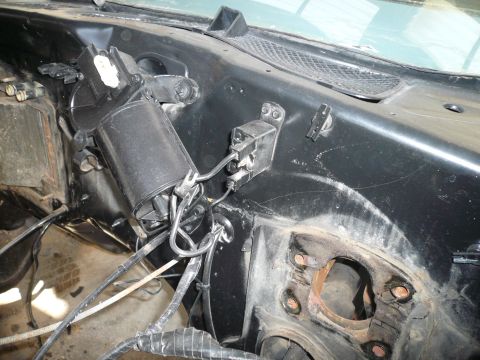 1975 Ford Ranchero - Close-up of a vehicle's windshield wiper motor assembly and associated wiring.