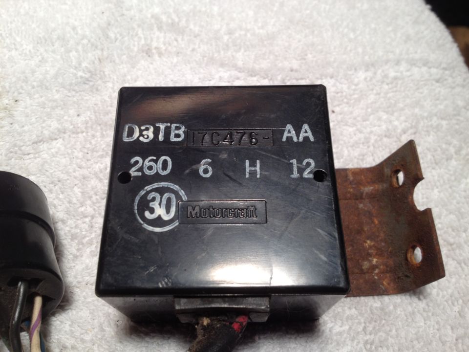Close-up of a black Motorcraft wiper delay module with part numbers D3TB 17C476-AA and 260 6 H 12 stamped on it