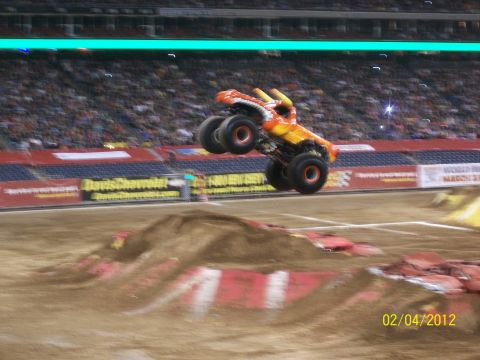 1989 Ford Bronco - A monster truck soars through the air during an event, captured on camera on 02/04/2012.