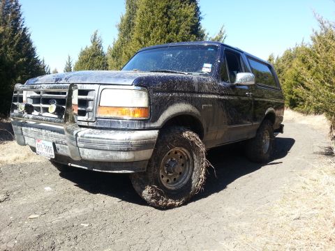 1995 Ford Bronco - This 1995 Ford Bronco is covered in mud after driving off-road.