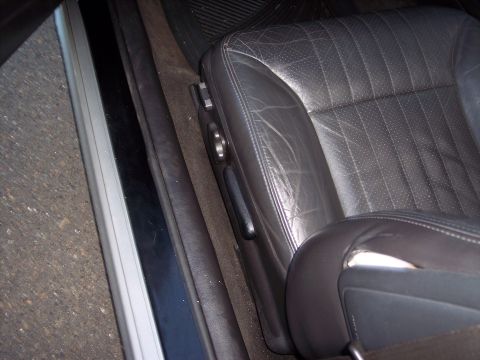 2002 Chevrolet Monte Carlo - Interior shot shows the driver's seat with signs of wear and tear.