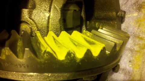 1996 Ford Bronco - Differential gears marked with yellow compound for inspection.