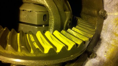 1996 Ford Bronco - Close-up view of internal differential gears with yellow highlighting on the teeth.