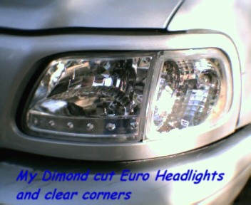 2000 Ford F-150 - Custom headlights with clear corner markers are installed on this truck.