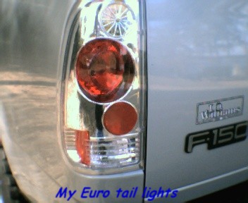 2000 Ford F-150 - Detail of the taillight and F-150 badging on a 2000 Ford F-150 truck.