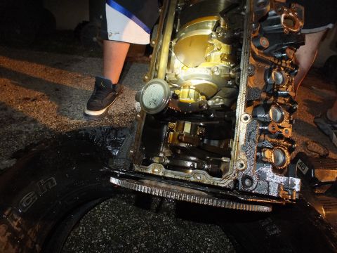2003 Ford Crown Victoria - Detailed look at an engine block's crankshaft and connecting rods during a teardown