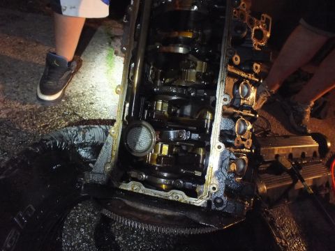 2003 Ford Crown Victoria - Open engine block reveals cylinder bores, crankshaft and rod caps in a night teardown