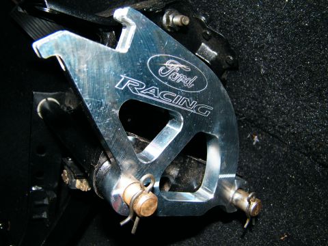 2004 Ford Crown Victoria - Close-up of a Ford Racing brake caliper bracket, showing the brand logo.