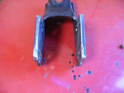 1976 Chevrolet Corvette - This is a metal bracket with a U-shaped opening and two mounting plates on the sides.