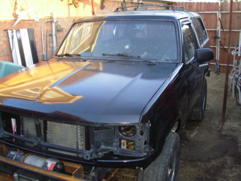 1983 Ford Bronco - I cut some new fender-to-cowl shims from 1/8" hardboard and aligned the fenders to the doors, then to the core support. I had to make…