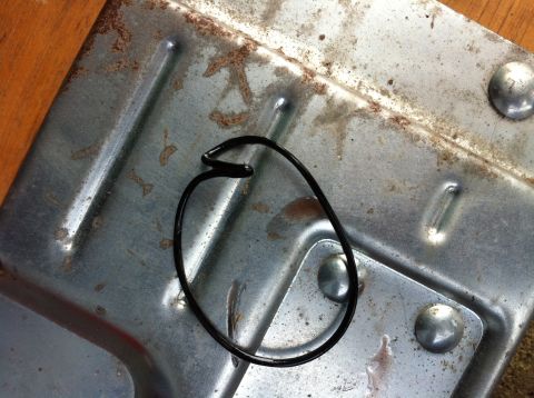1992 Ford F-150 - Here is the O-Ring for the Magnefine. It was coiled up like this in cap of the filter, not even sealing anything.