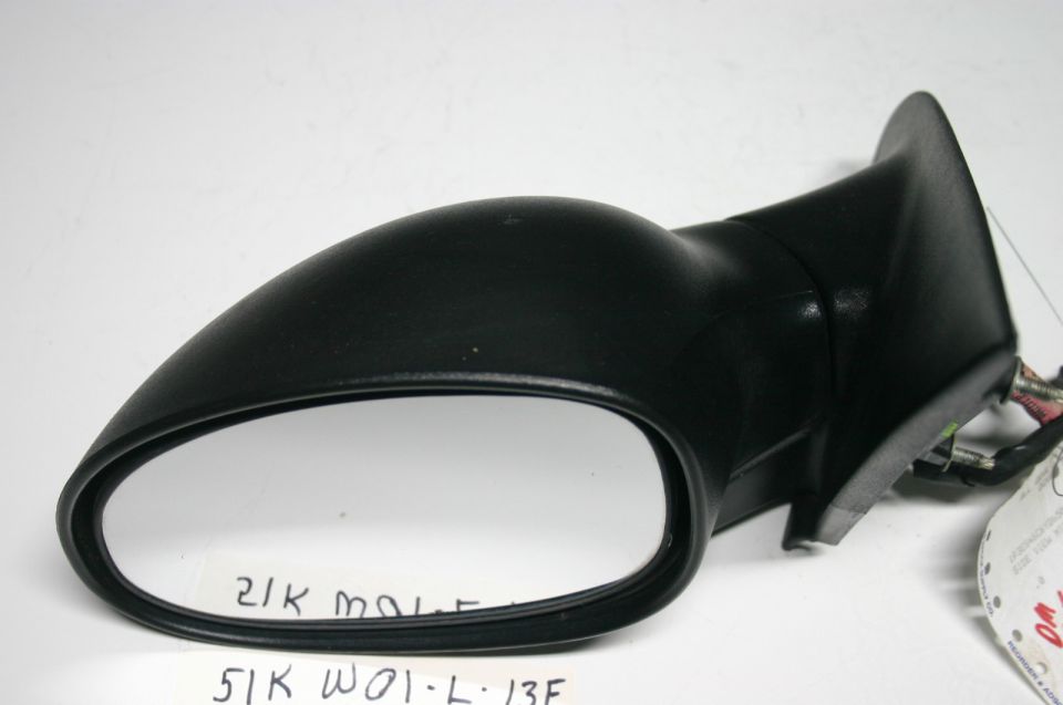 Black side mirror with visible wiring and handwritten text on the mirror surface
