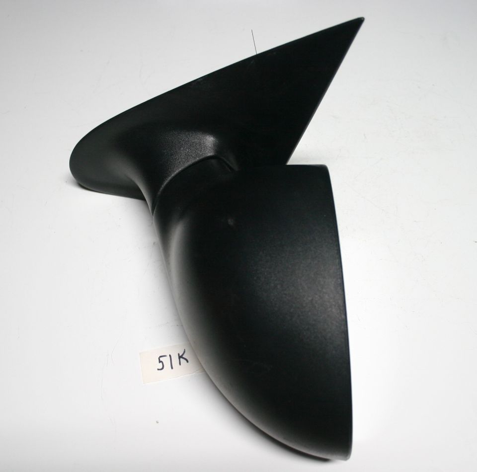 Black car side mirror, part number 51K visible on sticker